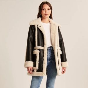 oversized sherpa-lined vegan leather coat